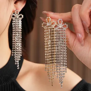 Vintage style crystal bowknot long tassel drop earrings in gold and silver finish