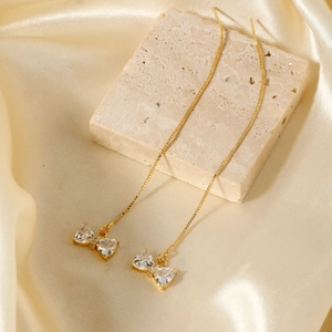 Elegant gold bow butterfly tassel drop earrings with sparkling zircon stones for women