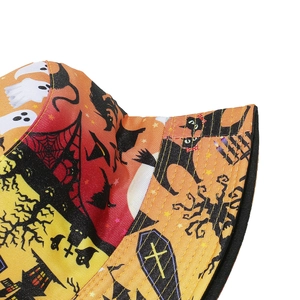 Detail of Halloween bucket hat with vibrant ghost, black cat, and spider web patterns