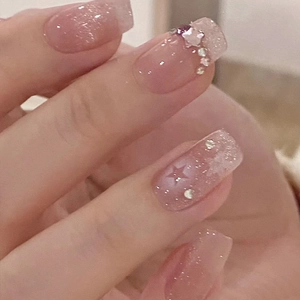 Short square jelly nails with silver glitter, star sequins and rhinestones decor