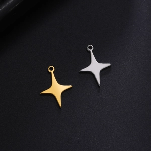 Polished gold and silver star pendants for DIY jewelry making on dark textured surface