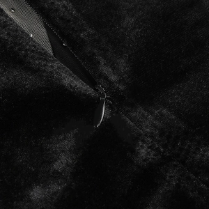 Close-up of high-quality black velvet fabric texture with a seamless invisible zipper