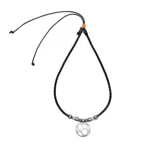 Detail of vintage silver football pendant on black braided faux leather cord necklace