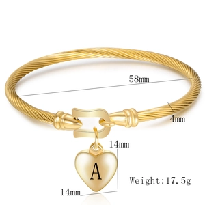 Detail showing 58mm inner diameter and 17.5g weight of heart alphabet bangle