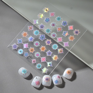 Iridescent 5D bohemian nail stickers with floral designs and sparkling crystal accents