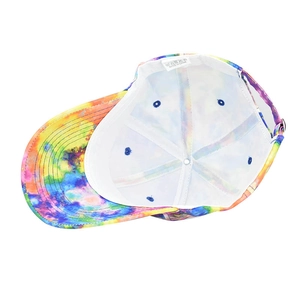 Detail of colorful tie-dye baseball cap interior with breathable holes and metal buckle