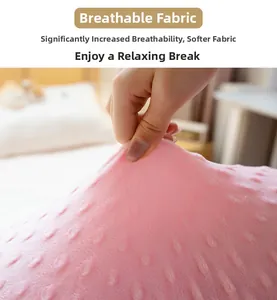 Close-up of pink 3D dotted plush fabric showing soft texture and breathable material