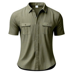 Detail of olive green short sleeve linen shirt featuring button pockets and fabric texture