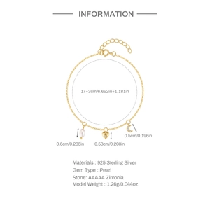 Detail of 925 sterling silver bracelet with pearl, heart and moon charms on white background