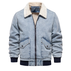 Detail of light blue denim jacket featuring white fleece collar and ribbed elastic cuffs