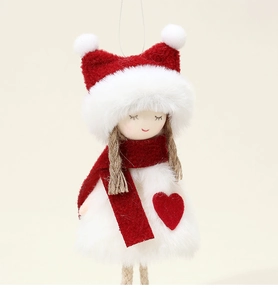 Close-up of plush angel girl doll with red scarf and fuzzy hair for Christmas tree decor