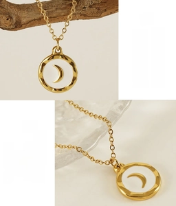 Close-up of gold moon enamel pendant made of lead-free and nickel-free stainless steel