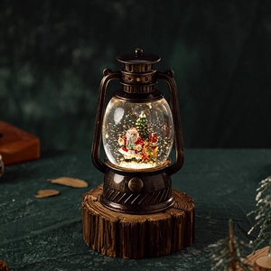 Vintage bronze Christmas lantern with Santa scene, snow globe effect and warm LED lighting