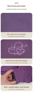 Detail of purple ribbed knit dog sweater with Infinite Love heart embroidery and soft fabric
