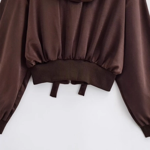 French retro dark brown cropped hooded jacket with smooth satin finish and ribbed trim