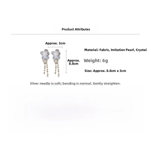 Detail view of lace flower earrings with pearls and crystal tassels showing 8.8cm length