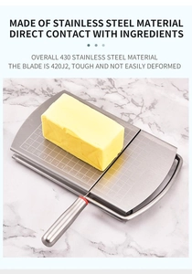 Macro detail of a stainless steel cheese slicer cutting butter with precise cm scales