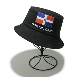 Detail of Dominican Republic flag and Dominicana print on black cotton bucket hat