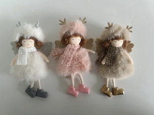 Detailed view of three plush Christmas angel dolls with glittery antlers and fur skirts