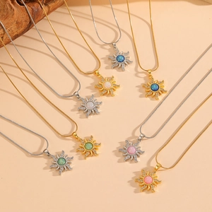 Minimalist sun pendant necklaces with opal centers in gold and silver stainless steel chain