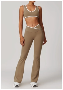 Detail view of khaki yoga set with contrast piping and cross v-waistband design