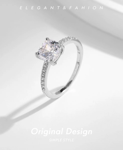 Macro view of S925 sterling silver ring featuring square zircon and four-prong setting