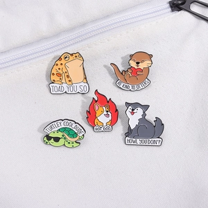 Cartoon animal enamel pin set with turtle and frog on white canvas bag accessory