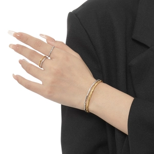 Minimalist S925 sterling silver bracelets and rings with irregular textured finish on model