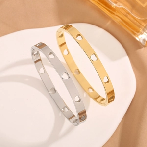 Polished 18k gold and silver hollow heart pattern stainless steel open cuff bracelets