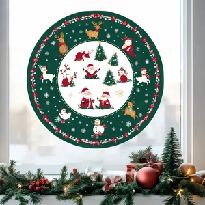 Christmas window cling featuring Santa and reindeer on glass with festive home decor