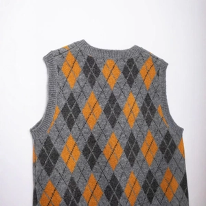Vintage argyle knit vest in grey with orange and dark grey diamond pattern for women