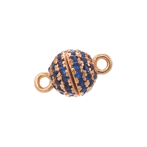 Macro shot of rose gold magnetic jewelry clasp with micro-pave blue cubic zirconia