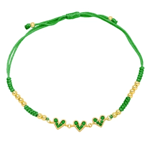 Handmade woven green heart bracelet with colorful zircon and golden beads in boho style