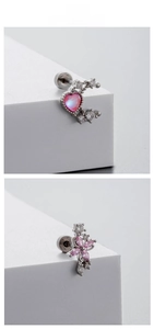 Detail of pink heart and flower zircon pendants on titanium steel screw back earrings