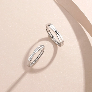 S925 sterling silver Mobius couple rings featuring a minimalist twisted design and zircons