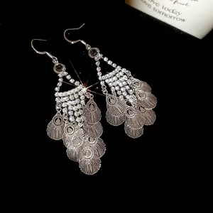 Sparkling silver leaf tassel earrings with leaf-shaped metal sheets and rhinestones