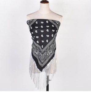 Detail of black paisley bandeau top featuring shimmering silver fringe and street style