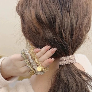 Elegant crystal bead hair tie and bracelet set in champagne, grey, and pink tones