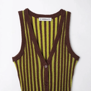 Women's V-neck sleeveless knit dress featuring retro green and brown vertical stripes