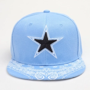 Close-up of sky blue baseball cap featuring embroidered star and paisley pattern brim