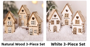 Miniature wooden Christmas house ornaments with heart cutouts in wood and white finishes