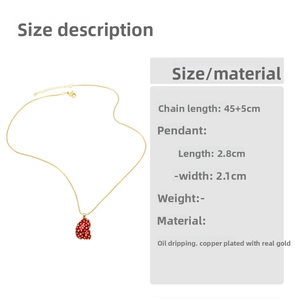 Size specifications of a gold plated copper necklace with red enamel heart pendant