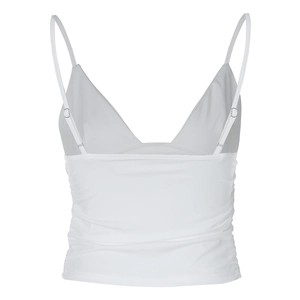 Detail view of white V-neck camisole featuring thin straps and smooth soft fabric texture