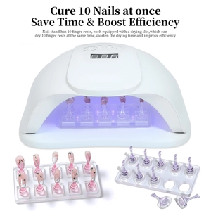 UV LED nail lamp with digital timer and clear acrylic display stands for nail art practice