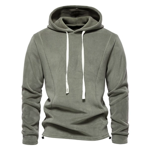 Detailed close-up of olive green polar fleece hoodie featuring adjustable drawstring hem