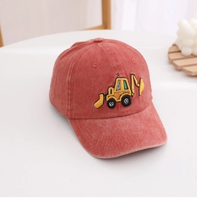 Detail of a washed cotton kids baseball cap with a yellow excavator embroidery