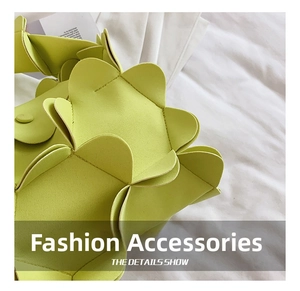 Detailed view of layered lemon yellow leather petal design on a summer shoulder bag