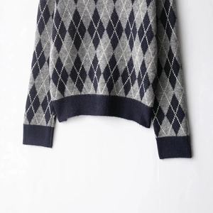 Classic argyle pattern knitted sweater with navy ribbed hem and cuffs detail