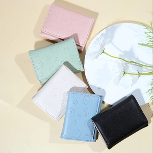 Cute Korean style PU leather short wallets for women in five pastel colors with bear embossing