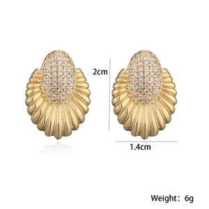 Detail view of gold fan-shaped shell earrings with zircon, size 2cm by 1.4cm, 6g weight